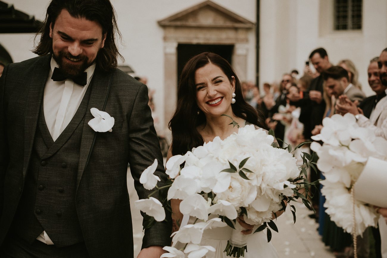 Photo of a bride and groom by their Lake Bled Wedding Photographer