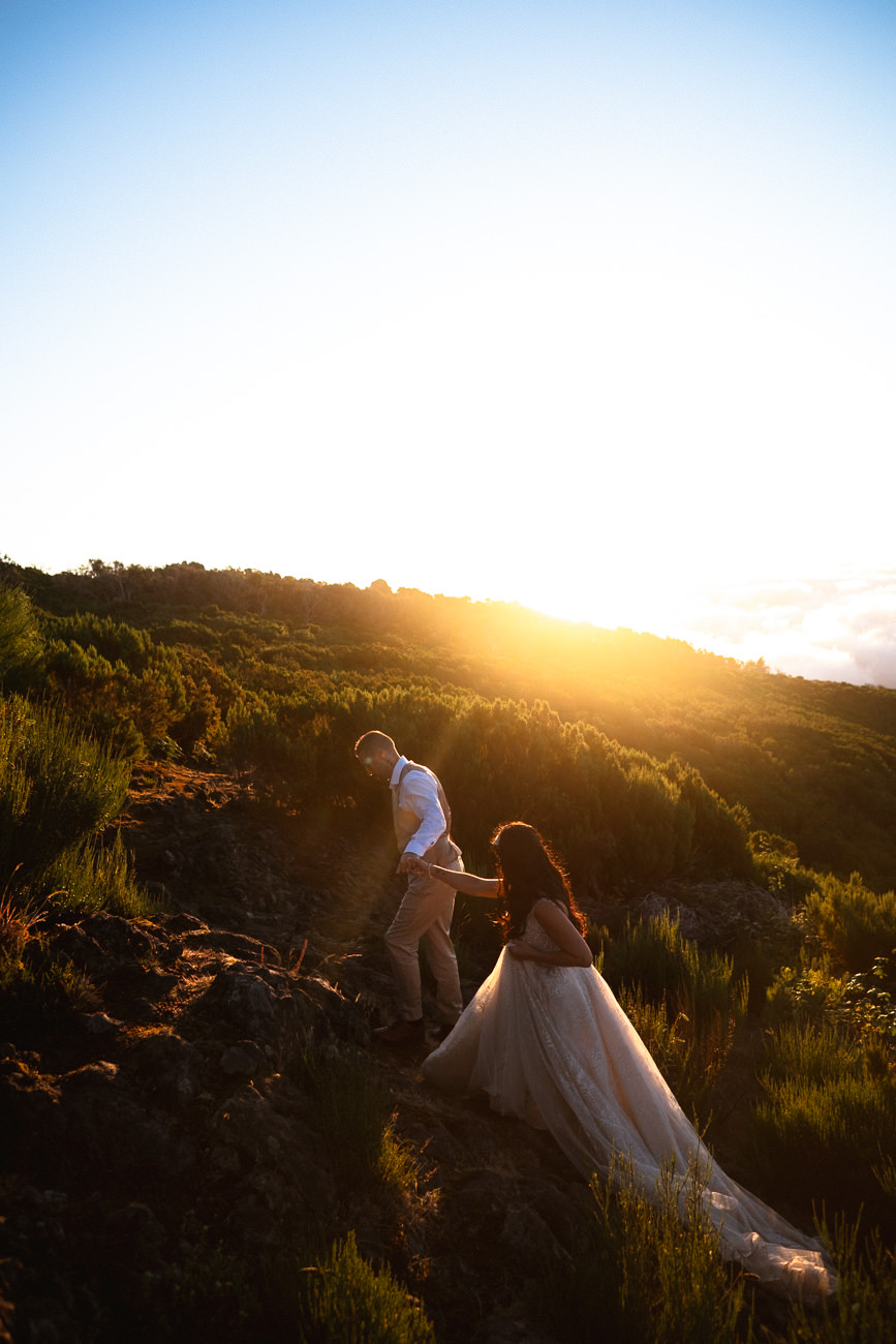 A bridal couple at sunrise on the morning of their Madeira elopement