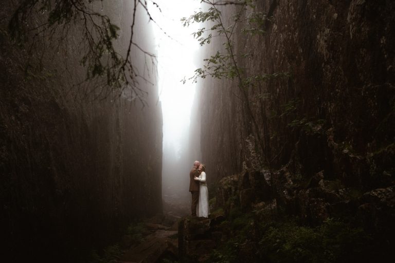 A bride and groom at their hiking elopement in Sweden