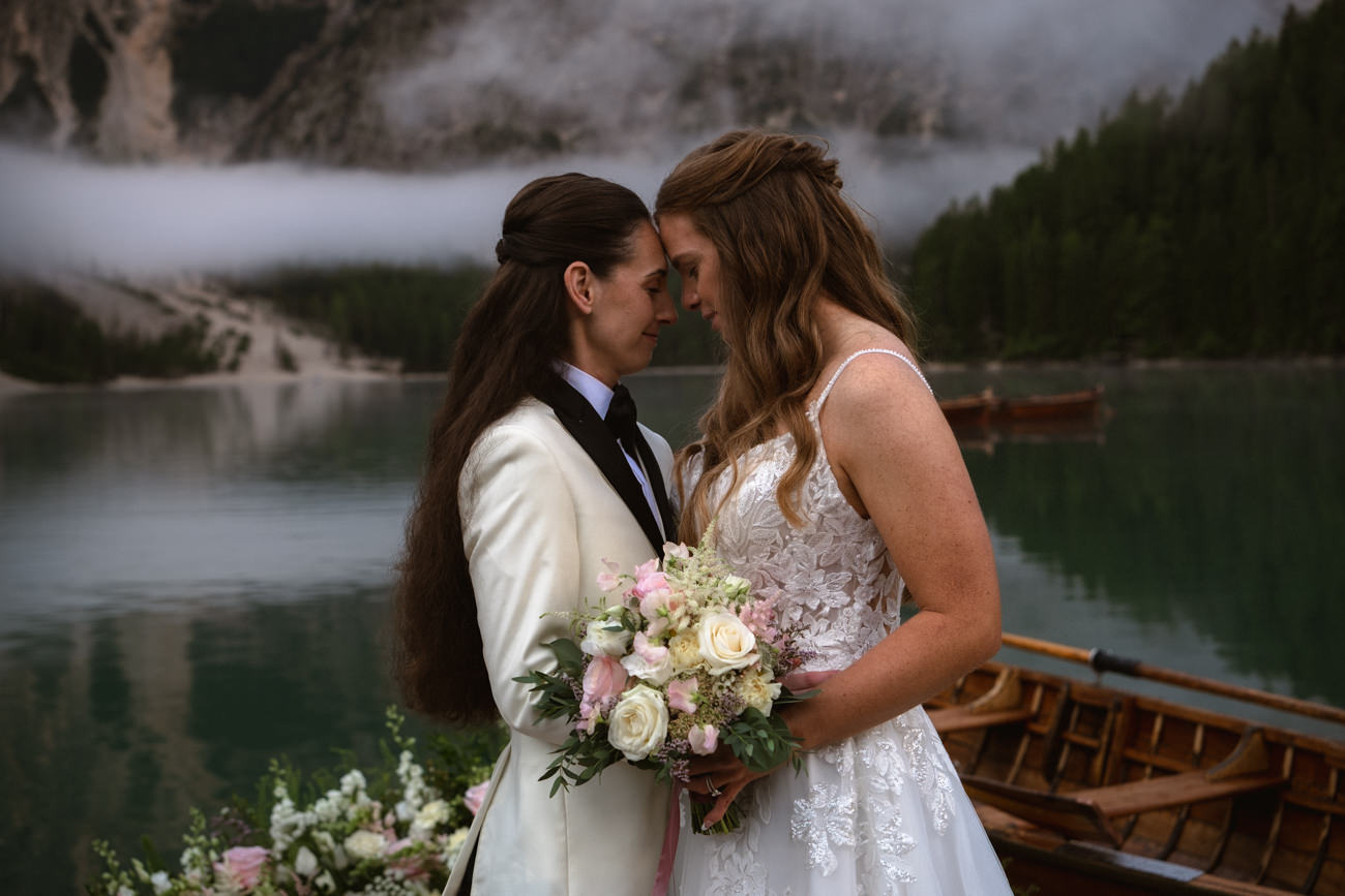 Two brides eloping at Lago di Braies