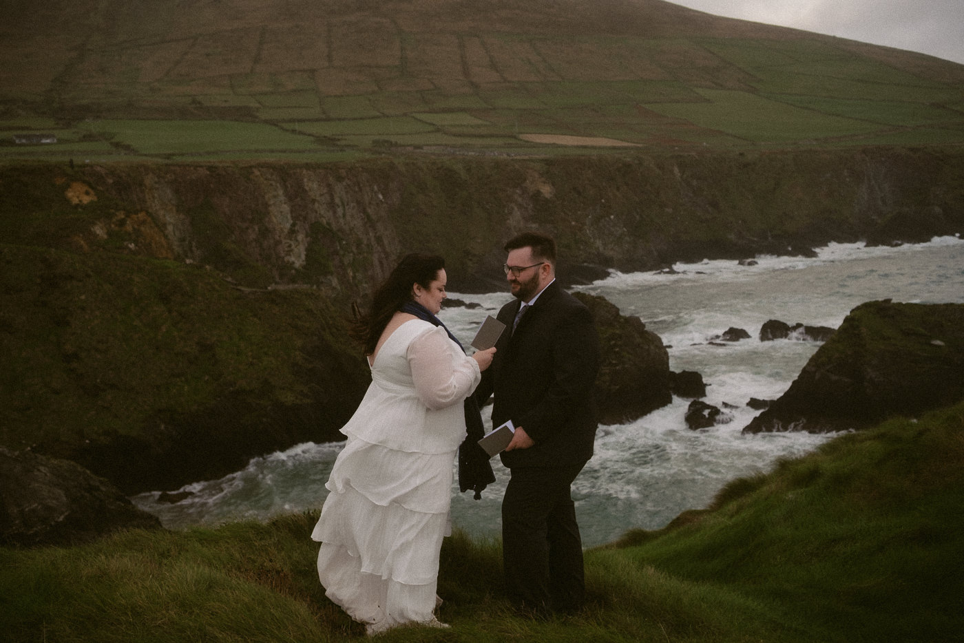 Cliffside elopement ceremony at Dunquin Pier in the Dingle Peninsula