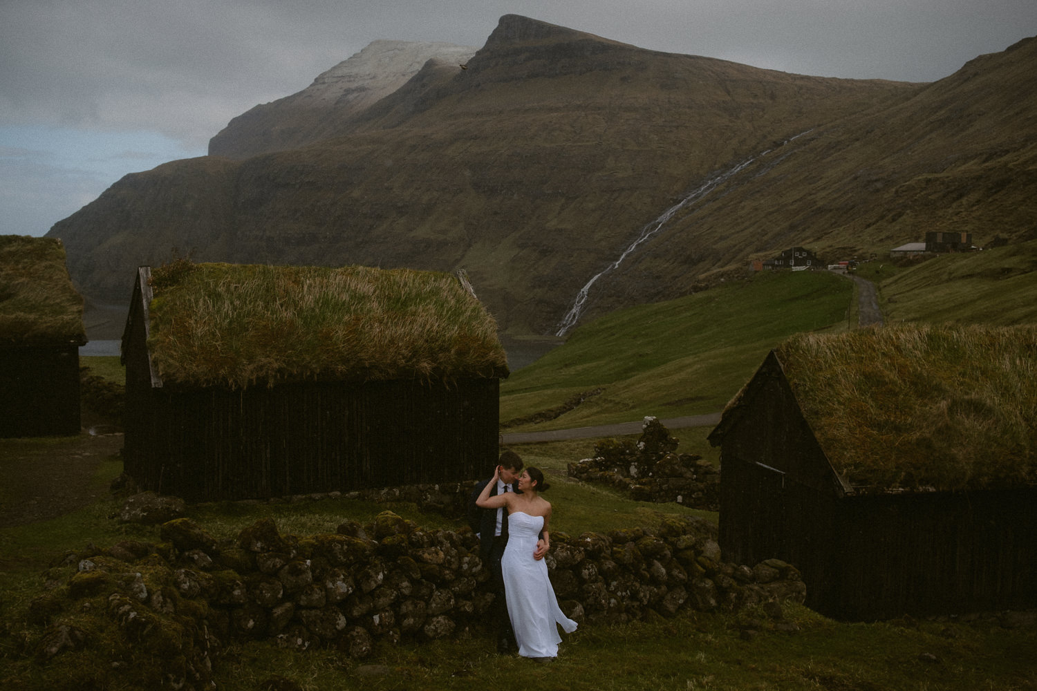 Couple eloping in Saksun village in the Faroe Islands