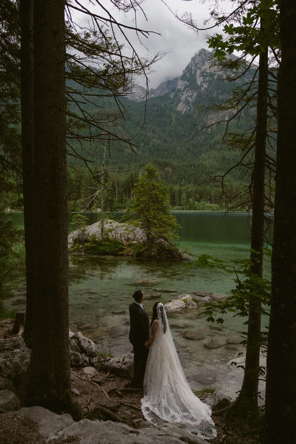A bride and groom during their elopement day at Lake Hintersee